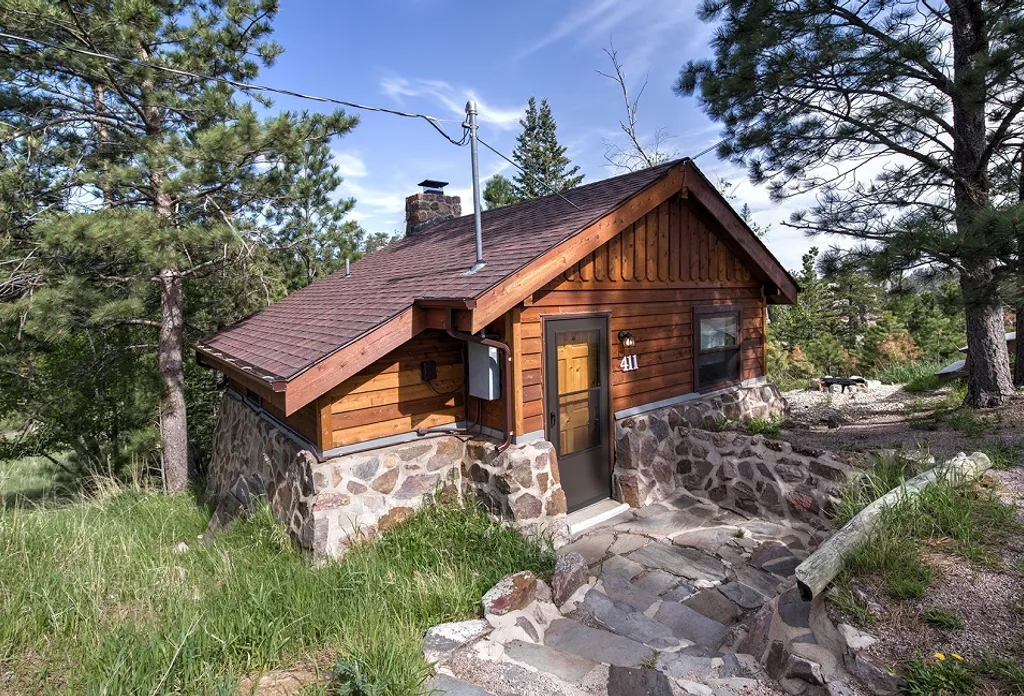 Cabin 411 exterior tucked in pines